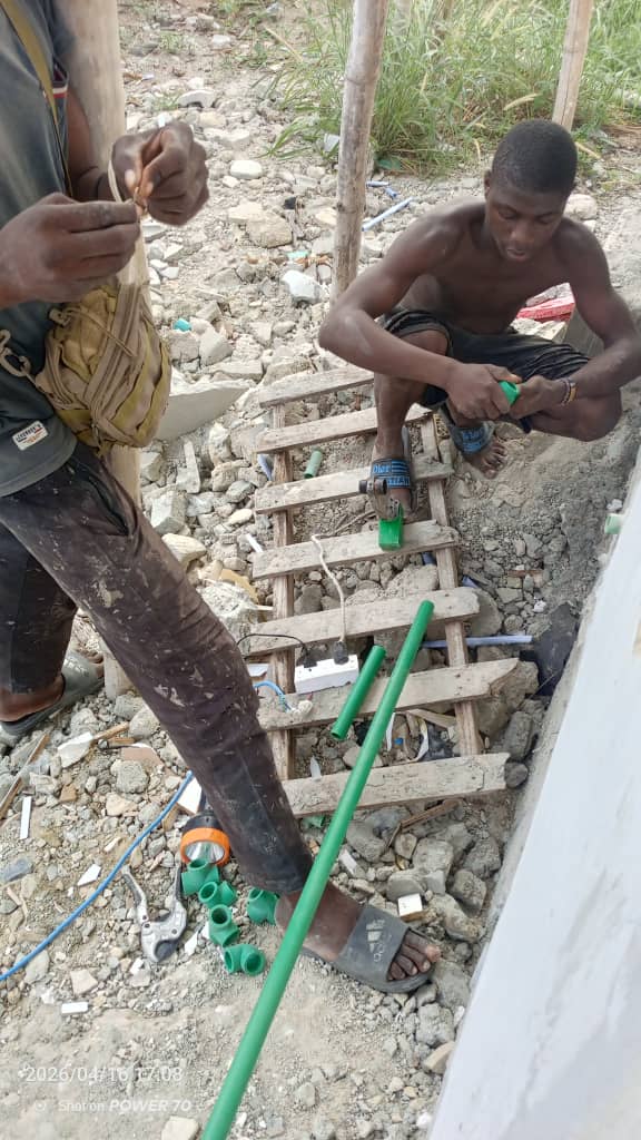 Screeders and plumbers working at the four unit terrace – Bolanle Dé Residence, Shapati Lagos