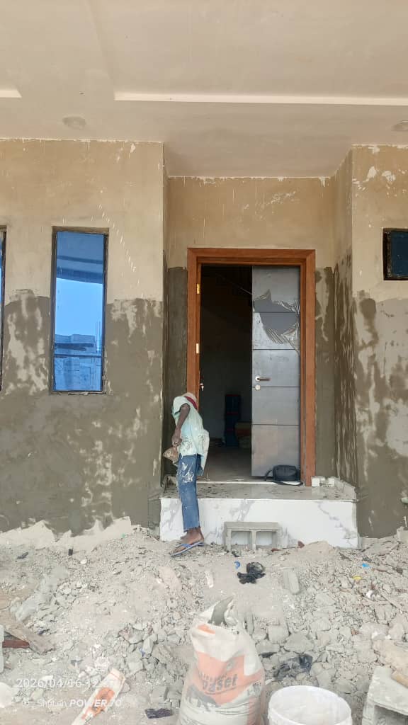 Screeders and plumbers working at the four unit terrace – Bolanle Dé Residence, Shapati Lagos